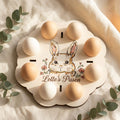 Houten paasdecoratie met konijn en eieren